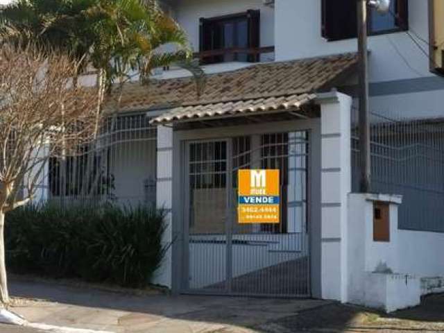 Casa com 4 quartos à venda na Rua das Petúnias, 144, Estância Velha, Canoas por R$ 1.070.000