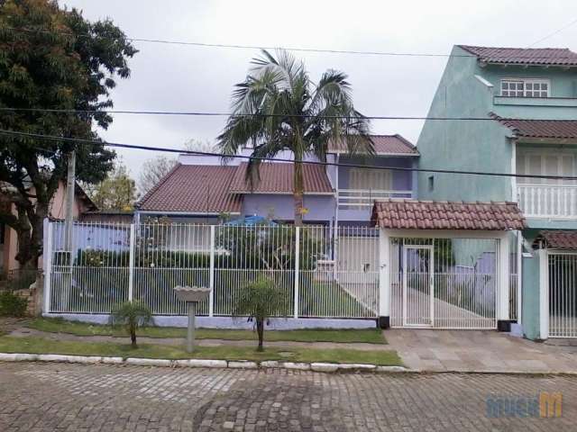 Casa com 4 quartos à venda na Rua dos Lírios, 77, Igara, Canoas por R$ 744.681