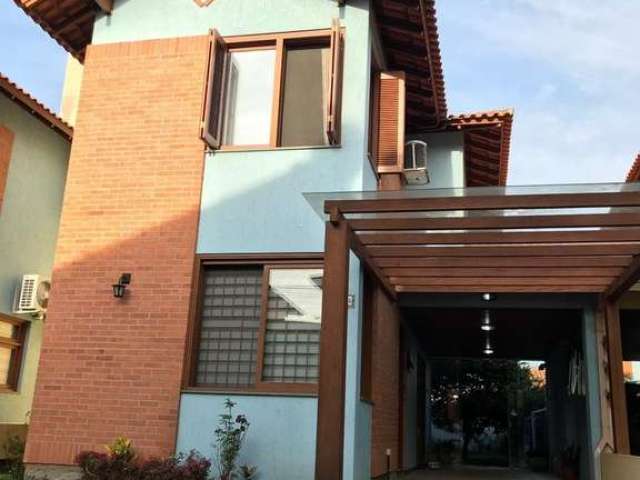 Casa em condomínio fechado com 3 quartos à venda na Rua dos Jasmins, 120, Igara, Canoas por R$ 770.000