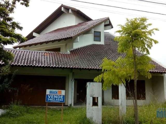 Casa em condomínio fechado com 4 quartos à venda na Rua Irmão Inocêncio Atanasio, 484, Marechal Rondon, Canoas por R$ 1.200.000