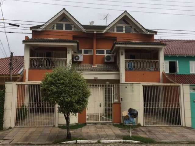 Casa em condomínio fechado com 3 quartos à venda na Avenida Inconfidência, 1663, Marechal Rondon, Canoas por R$ 1.500.000