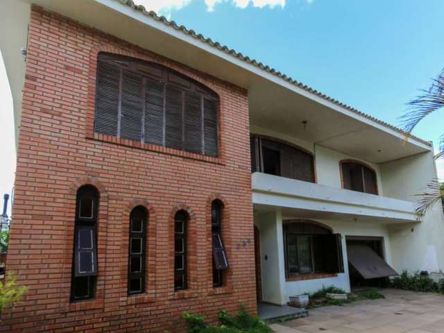 Casa em condomínio fechado com 5 quartos à venda na Rua Santa Terezinha, 286, Nossa Senhora das Graças, Canoas por R$ 810.000