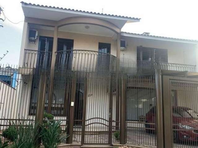 Casa com 4 quartos à venda na Rua da Felicidade, 124, Estância Velha, Canoas por R$ 1.100.000