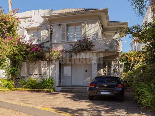 Casa em condomínio fechado com 3 quartos à venda na Rua Xavier Ferreira, 90, Auxiliadora, Porto Alegre por R$ 1.149.000