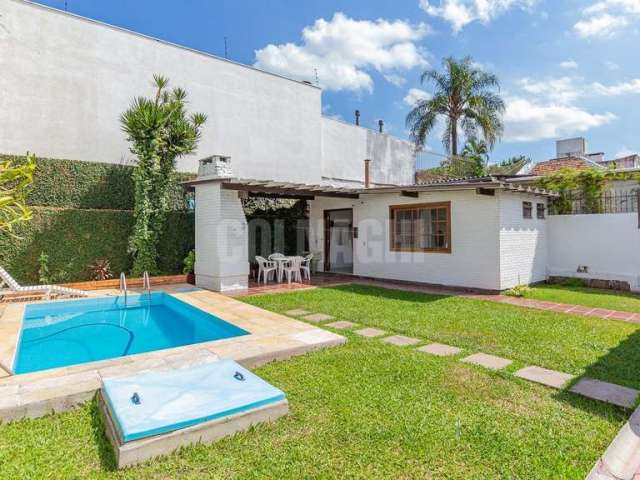 Casa em condomínio fechado com 3 quartos à venda na Rua João Paetzel, 821, Chácara das Pedras, Porto Alegre por R$ 1.489.000