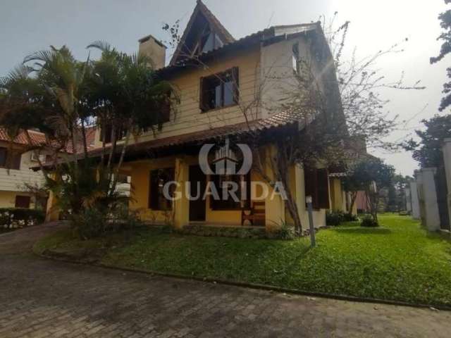 Casa em condomínio fechado com 3 quartos à venda na Rua Luís Felipe Monmany, 101, Espírito Santo, Porto Alegre por R$ 565.000