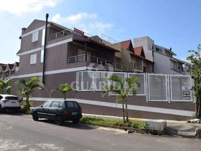 Casa com 3 quartos à venda na Rua Heitor Kramer, 370, Guarujá, Porto Alegre por R$ 529.000