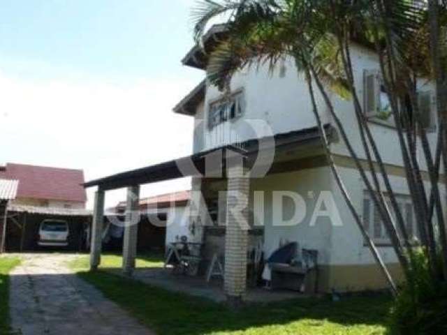 Casa com 4 quartos à venda na Rua Hilário Cristo, 345, Aberta dos Morros, Porto Alegre por R$ 600.000