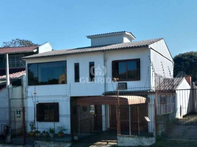 Casa com 3 quartos à venda na Avenida Valado, 158, Vila João Pessoa, Porto Alegre por R$ 620.000