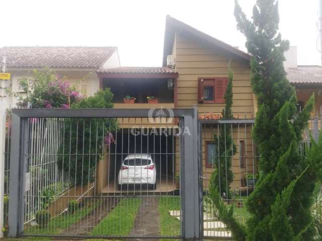 Casa com 4 quartos à venda na Rua Professor Antônio José Remião, 300, Espírito Santo, Porto Alegre por R$ 820.000