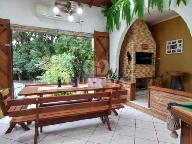 Casa com 3 quartos à venda na Estrada João Vedana, 364, Cavalhada, Porto Alegre por R$ 1.800.000