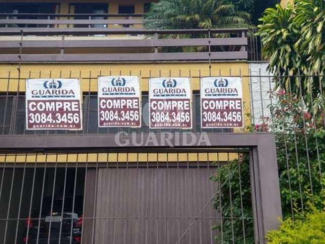 Casa com 3 quartos à venda na Rua Coronel Ruy da Cunha Paim, 35, Nonoai, Porto Alegre por R$ 900.000