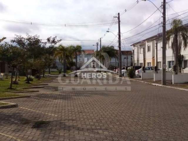 Casa em condomínio fechado com 3 quartos à venda na Avenida Edgar Pires de Castro, 2520, Hípica, Porto Alegre por R$ 382.000