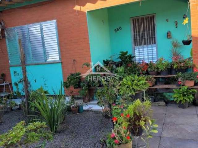 Casa com 3 quartos à venda na Rua João Vieira de Aguiar Sobrinho, 360, Belém Novo, Porto Alegre por R$ 350.000