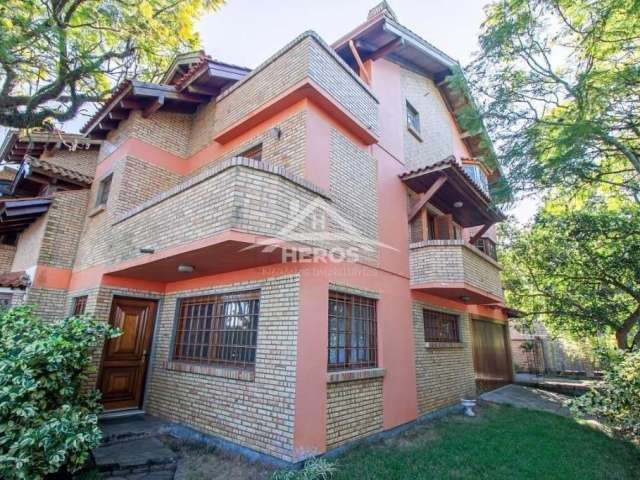 Casa em condomínio fechado com 4 quartos à venda na Avenida Guaíba, 10710, Ipanema, Porto Alegre por R$ 1.040.000