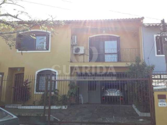 Casa com 3 quartos à venda na Rua André Primo Biazetto, 414, Campo Novo, Porto Alegre por R$ 1.100.000