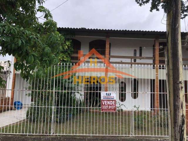 Casa em condomínio fechado com 3 quartos à venda na Rua Mathilde Zatar, 128, Nonoai, Porto Alegre por R$ 690.000
