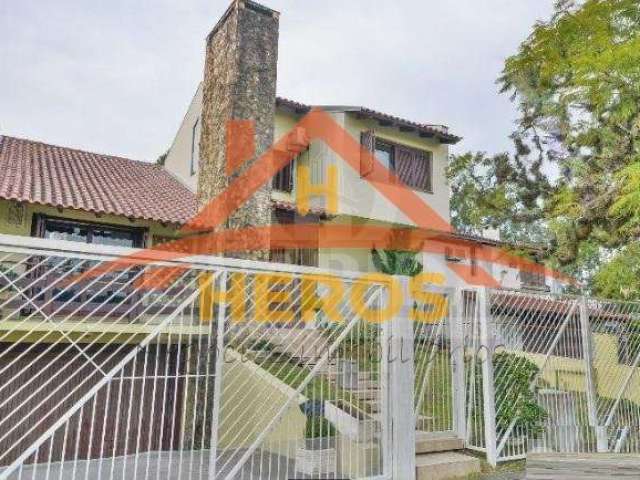 Casa com 3 quartos à venda na Rua Arnaldo Bernardi, 60, Ipanema, Porto Alegre por R$ 1.099.000