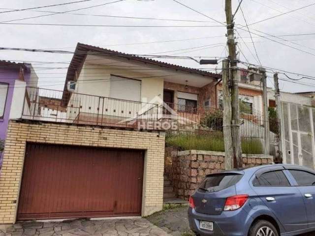 Casa com 3 quartos à venda na Doutor Lucidoro Brito, 135, Medianeira, Porto Alegre por R$ 440.000