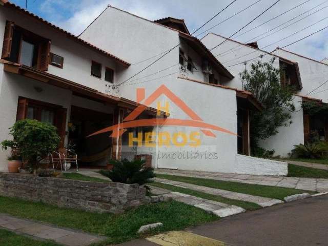 Casa em condomínio fechado com 3 quartos à venda na Avenida Eduardo Prado, 695, Cavalhada, Porto Alegre por R$ 750.000