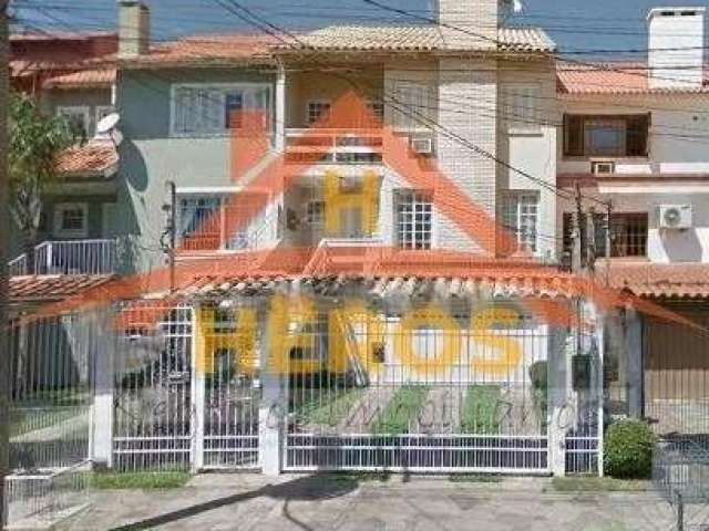 Casa com 3 quartos à venda na Rua Professor Antônio José Remião, 309, Espírito Santo, Porto Alegre por R$ 700.000