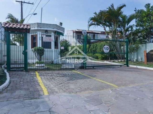 Casa em condomínio fechado com 3 quartos à venda na Rua Osório Mendes Ouriques, 332, Guarujá, Porto Alegre por R$ 399.000