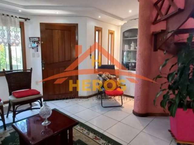 Casa com 3 quartos à venda na Rua Ocimar Antonio Pereira, 79, Hípica, Porto Alegre por R$ 498.000