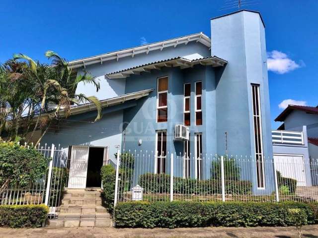 Casa com 4 quartos à venda na Rua Paulo Derly Strehl, 187, Espírito Santo, Porto Alegre por R$ 1.200.000