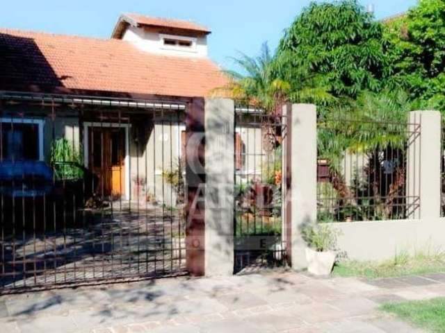 Casa com 3 quartos à venda na Rua Jayme Saul de Borba, 40, Espírito Santo, Porto Alegre por R$ 650.000