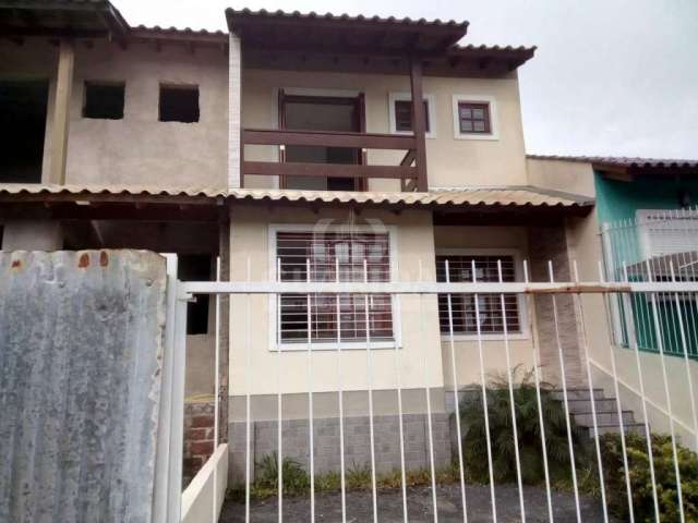 Casa com 3 quartos à venda na Rua Itacyr Rossi, 10, Guarujá, Porto Alegre por R$ 490.000