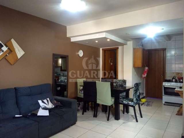 Casa com 3 quartos à venda na Rua Padre Roberto Landell de Moura, 124, Hípica, Porto Alegre por R$ 490.000