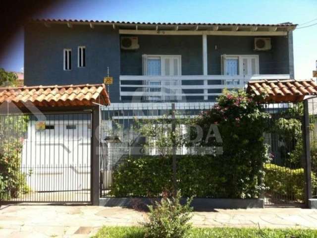 Casa com 4 quartos à venda na Rua Giruá, 63, Cavalhada, Porto Alegre por R$ 990.000