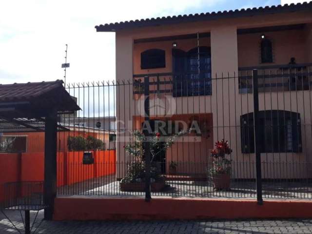 Casa com 3 quartos à venda na Rua Olegário Dias Maciel, 340, Espírito Santo, Porto Alegre por R$ 850.000