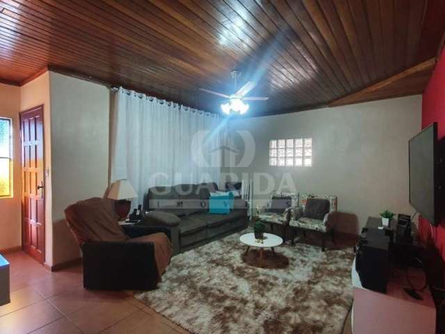 Casa com 2 quartos à venda na Rua Ângelo Passuelo, 480, Vila Nova, Porto Alegre por R$ 400.000