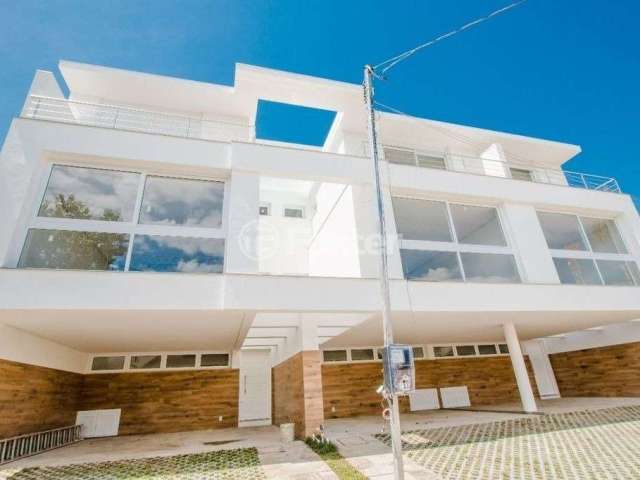 Casa em condomínio fechado com 3 quartos à venda na Rua José Pedro de Moura, 110, Jardim Isabel, Porto Alegre por R$ 945.000