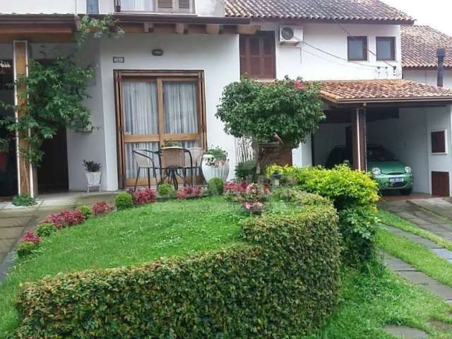 Casa em condomínio fechado com 3 quartos à venda na Avenida Eduardo Prado, 695, Cavalhada, Porto Alegre por R$ 750.000