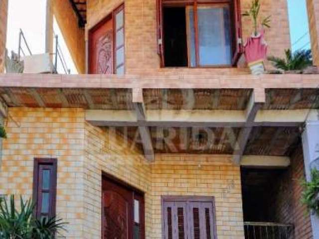 Casa com 3 quartos à venda na Rua Say Marques, 506, Hípica, Porto Alegre por R$ 290.000