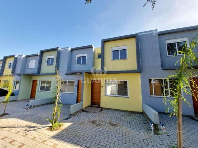 Casa em condomínio fechado com 2 quartos à venda na Rua Coronel Frederico Carlos Gomes, 110, Vila Nova, Porto Alegre por R$ 269.000