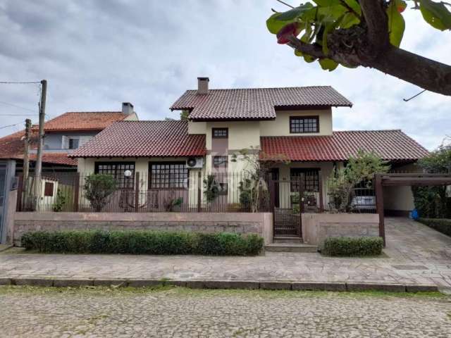 Casa com 3 quartos à venda na Rua Mampituba, 92, Ipanema, Porto Alegre por R$ 1.200.000