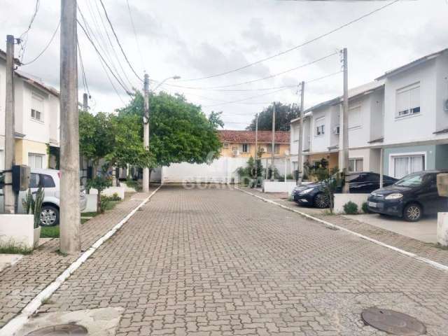 Casa em condomínio fechado com 3 quartos à venda na Avenida Edgar Pires de Castro, 2520, Hípica, Porto Alegre por R$ 349.000