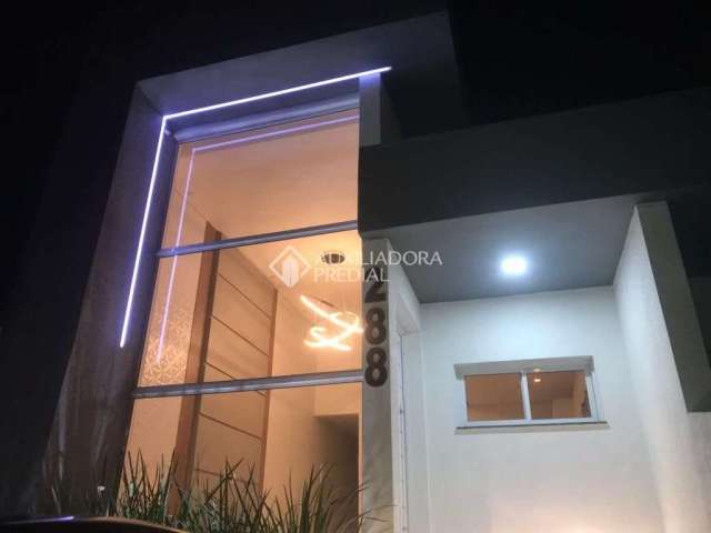 Casa com 3 quartos à venda na Rua Araranguá, 292, COHAB A, Gravataí, 105 m2 por R$ 459.000