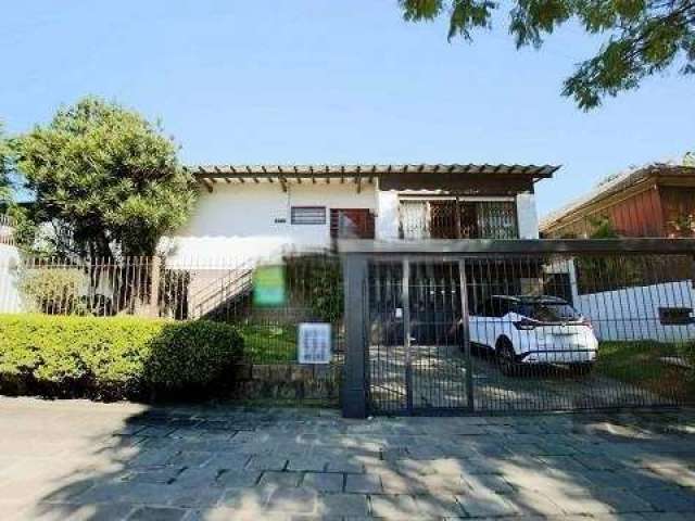 Casa com 4 quartos à venda na Rua João Paetzel, 821, Chácara das Pedras, Porto Alegre por R$ 1.490.000