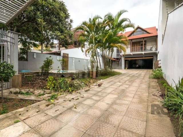 Casa com 4 quartos à venda na Avenida José Gertum, 369, Chácara das Pedras, Porto Alegre por R$ 2.000.000