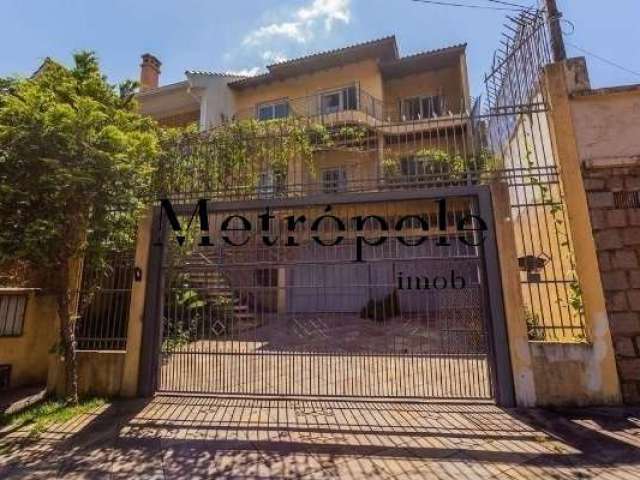 Casa com 5 quartos à venda na Rua Isidoro Tressi, 507, Jardim Botânico, Porto Alegre por R$ 1.615.000