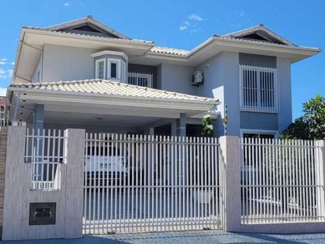 Casa em condomínio fechado com 3 quartos à venda na Rua Evaldo Probst, 1, Centro, Palhoça por R$ 1.500.000