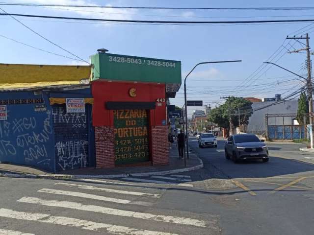 Terreno com salão e casa antiga a venda