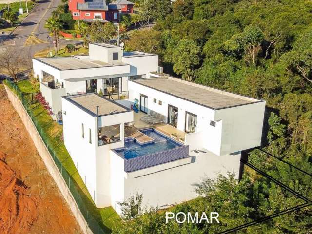 Venha se encantar com essa linda casa térrea, com um projeto apaixonante, com espaços integrados e dentro do condomínio Serra da Estrela em Atibaia SP