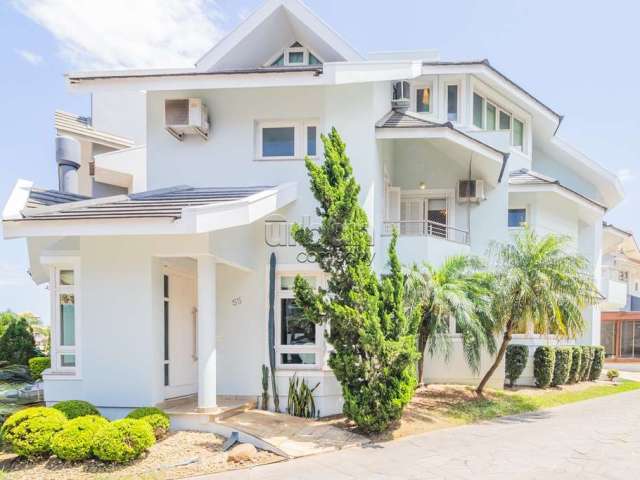 Casa em condomínio fechado com 4 quartos à venda na Ecoville, 190, Ecoville, Porto Alegre por R$ 1.499.000