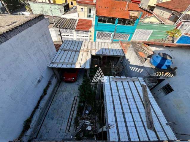 Terreno com casa incompleta para venda