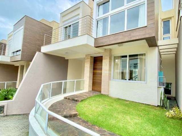 Casa em condomínio fechado com 3 quartos à venda na Estrada Haroldo Soares Glavan, 3375, Cacupé, Florianópolis por R$ 2.450.000